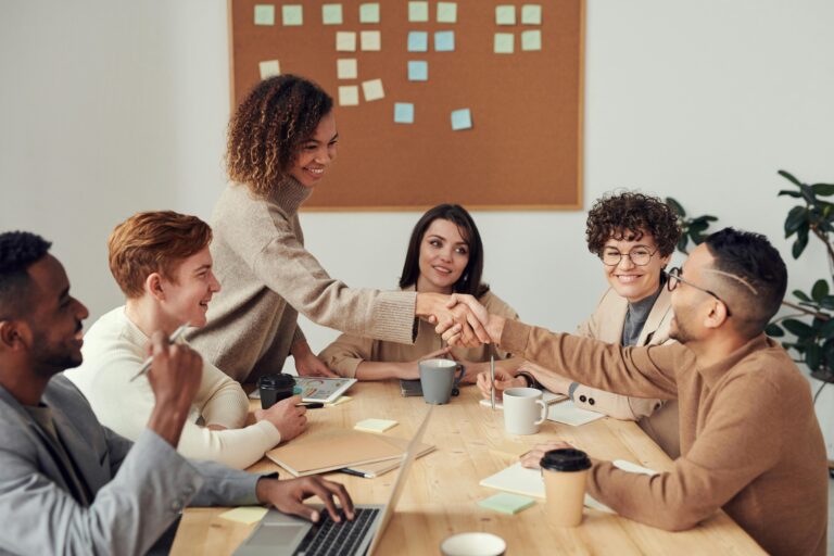 Business team reviewing financial reports with a part time controller