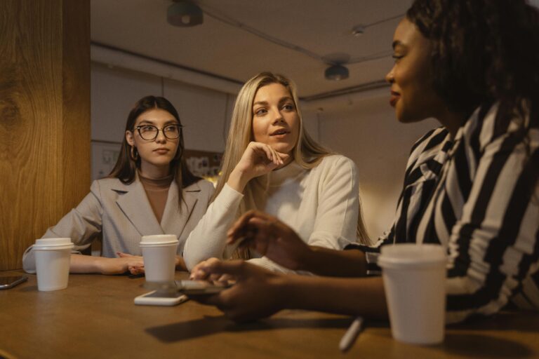 Business team reviewing 2026 budget strategy with support from a fractional CFO using financial forecasting tools
